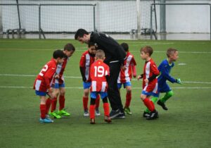 coach with a youth soccer team