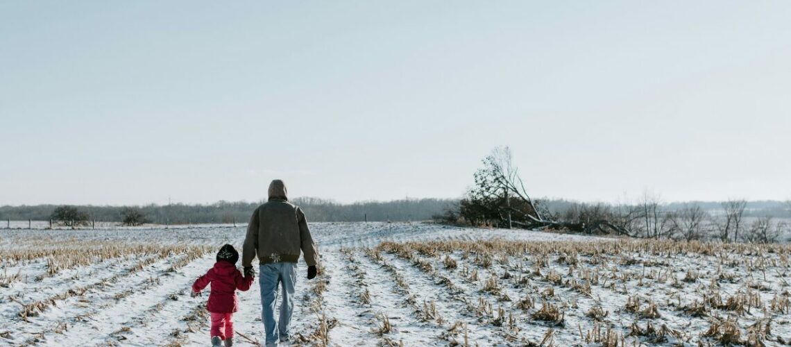 Man walking with young girl.