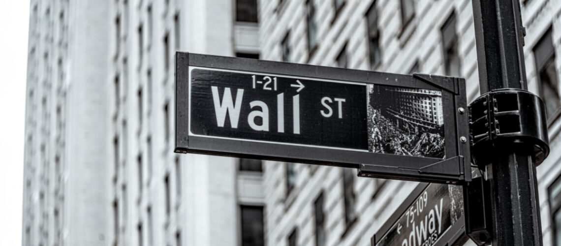 Black and white image of Wall Street street sign